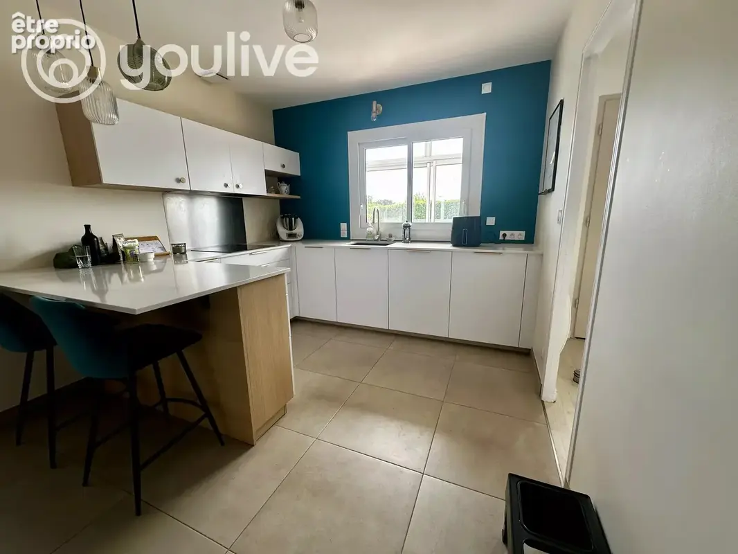 Maison plain-pied 103 m² – 3 chambres – jardin – véranda – grand garage - photo 4
