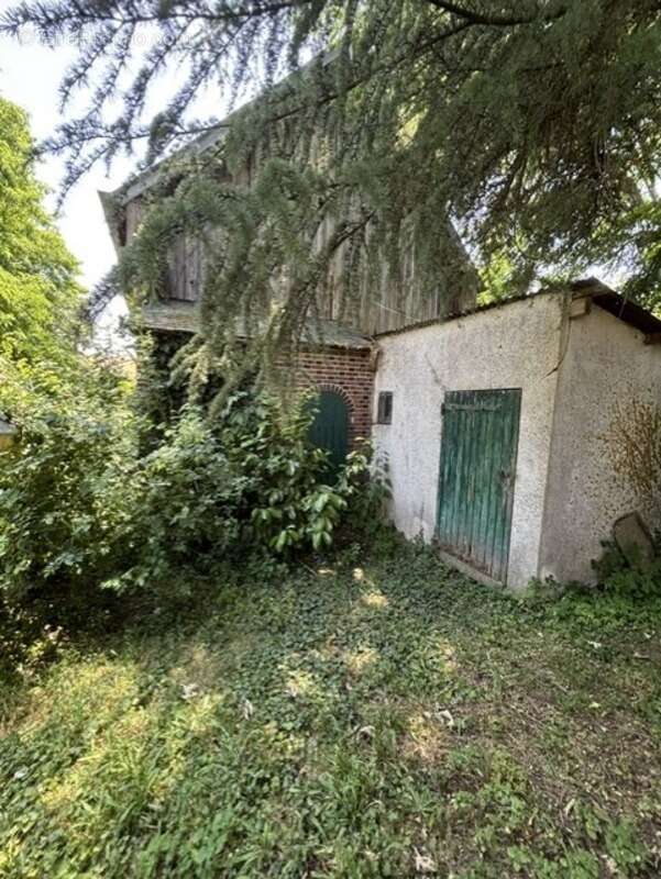 Un lieu de vie unique avec trois maisons aux possibilités infinies ! - photo 31