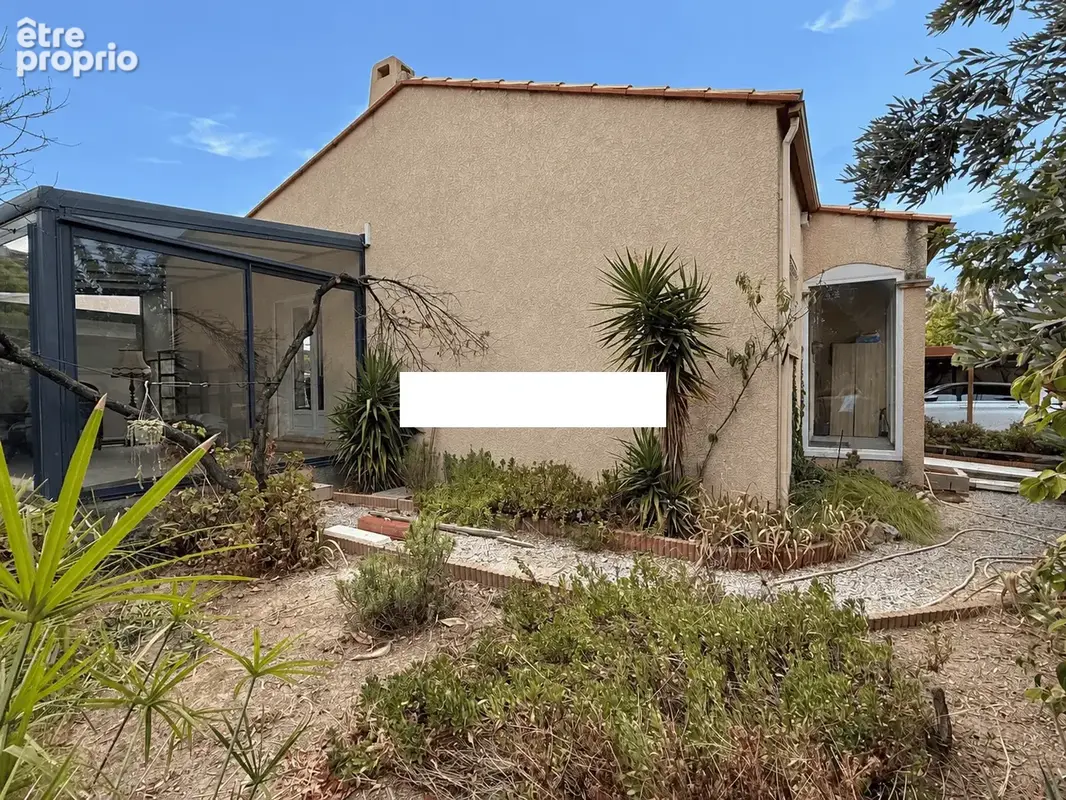 Maison 4 faces de plain-pied avec jardin, véranda et panneaux solaires - photo 2