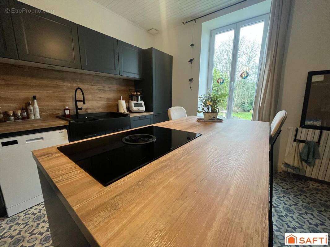 Photo 1 - Maison à BANNALEC