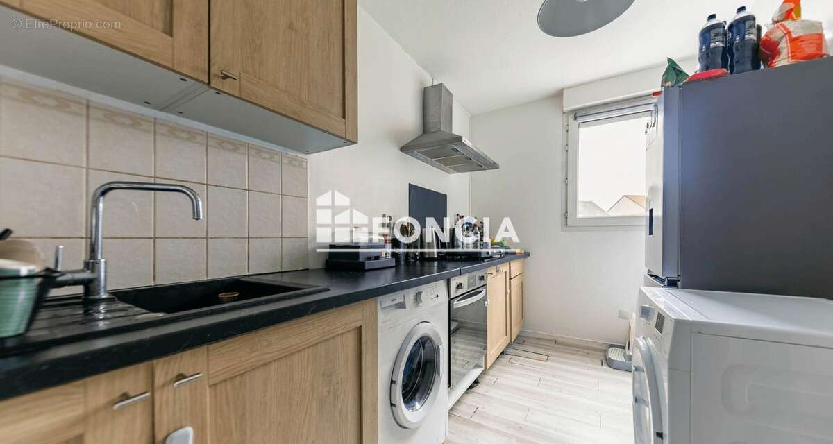 EXCLUSIVITE FONCIA -  Spacieux trois pièces avec balcon et parking intérieur - photo 5