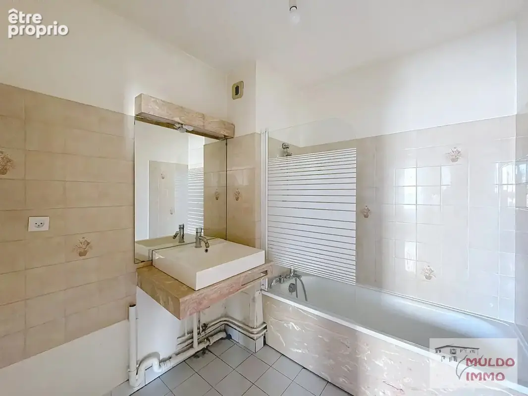T4 de 75 m²  avec parking et balcons - photo 9