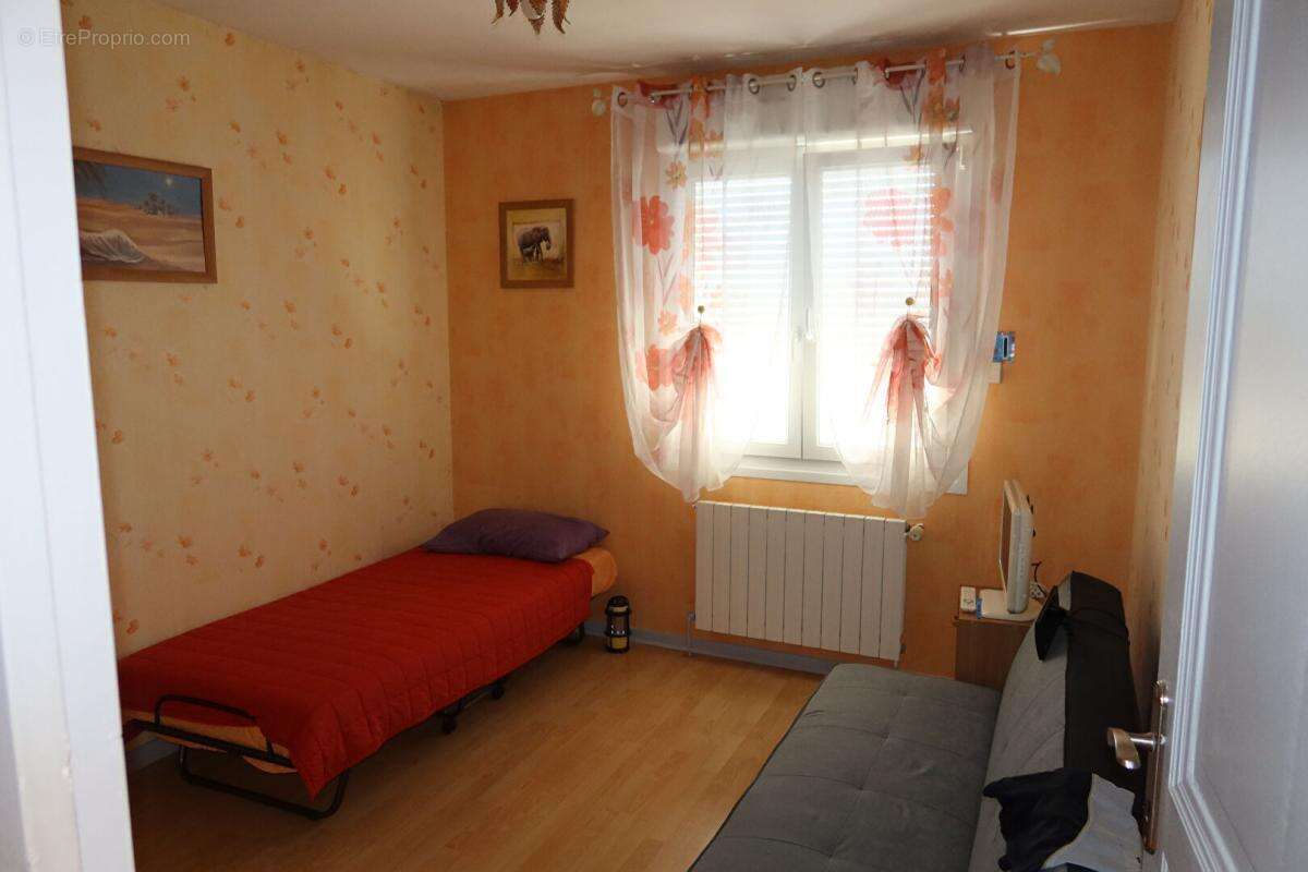 Maison à POUILLEY-LES-VIGNES