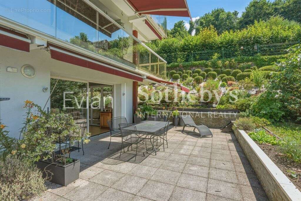Rare, Evian, T4 en rez de jardin surélevé de 113 m2 avec vue lac et terrasse de 82 m2. - photo 19