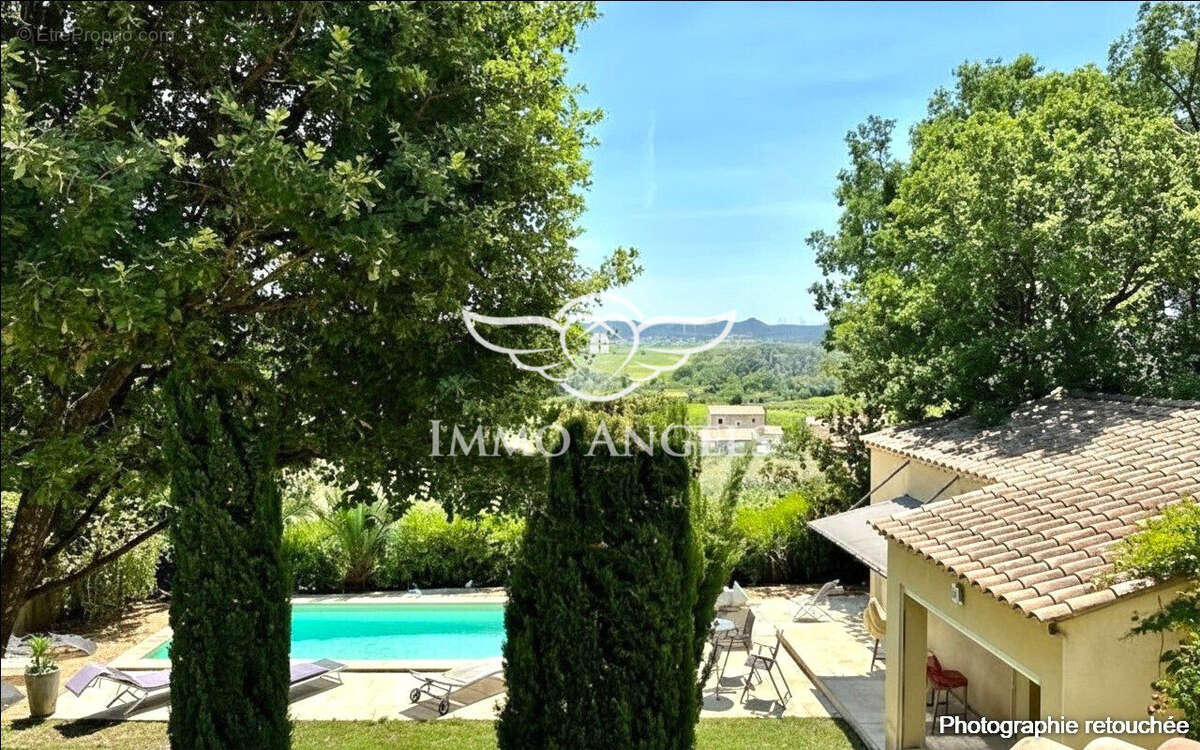 Maison à LAUDUN-L'ARDOISE