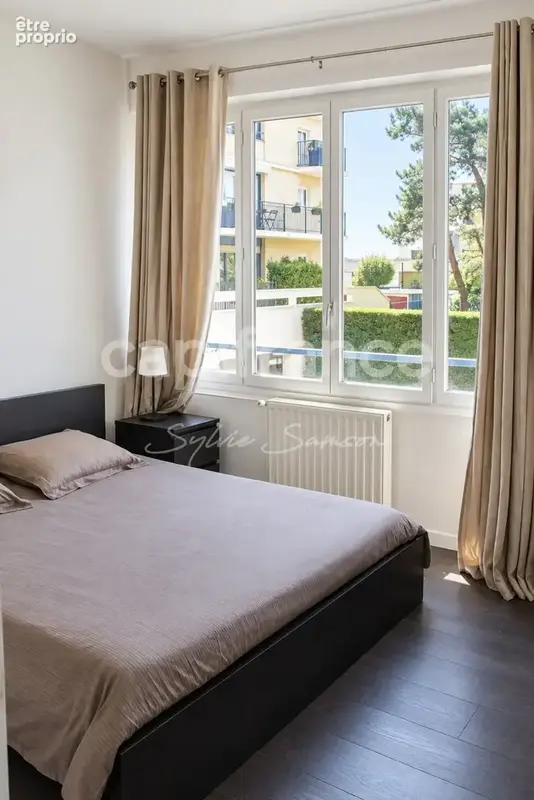 Mantes-la-Jolie – Appartement T3 traversant de 61 m² avec parking, cave et séchoir - photo 7