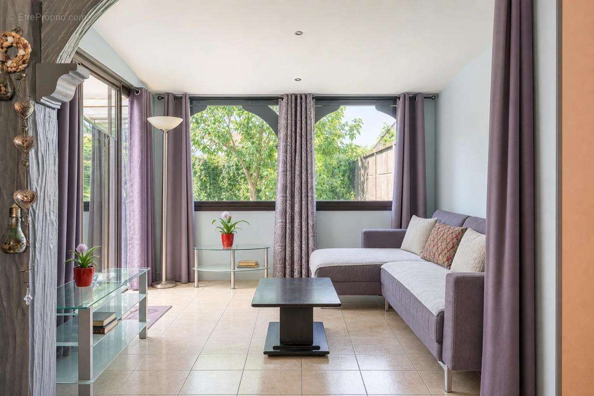 Maison de 5 pièces de 150 m² située à Sainte-Savine - photo 3