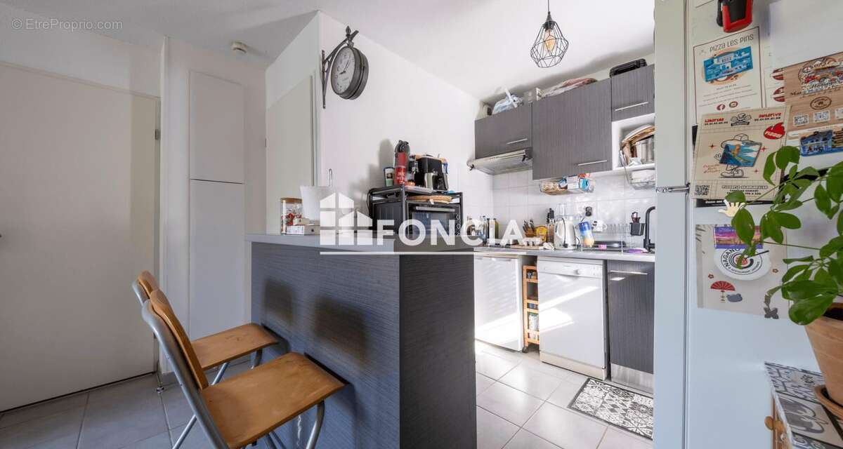 Appartement T2 en RDJ avec parking - photo 8