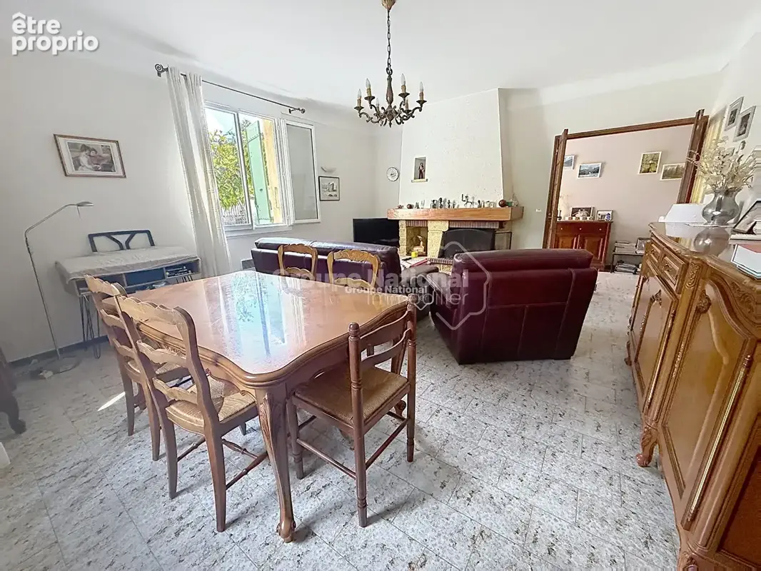 Maison familiale de plain-pied avec garage sur terrain de 802 m² - photo 2