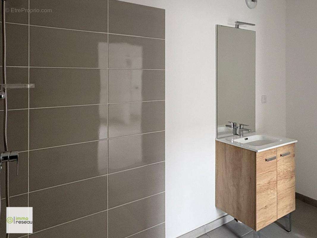 Appartement en rez-de-jardin - photo 7