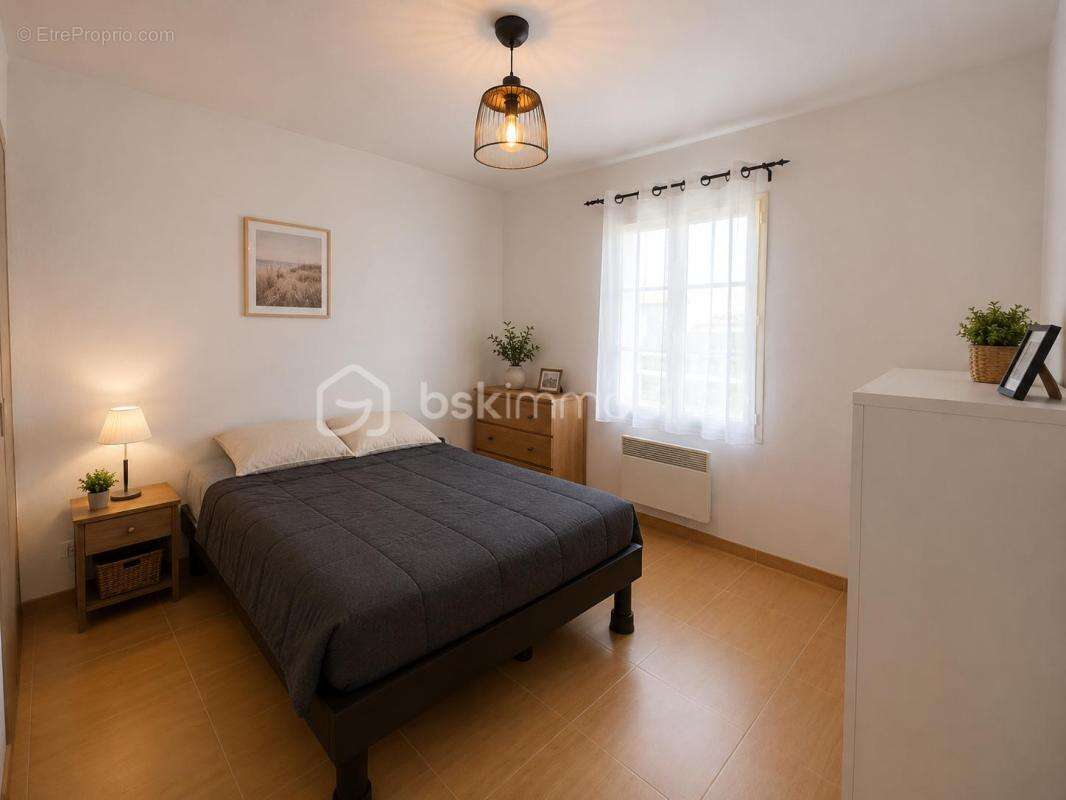 Maison de plain-pied 79 m² – 2 chambres – Jardin – Vendue louée – Arces-sur-Gironde - photo 6