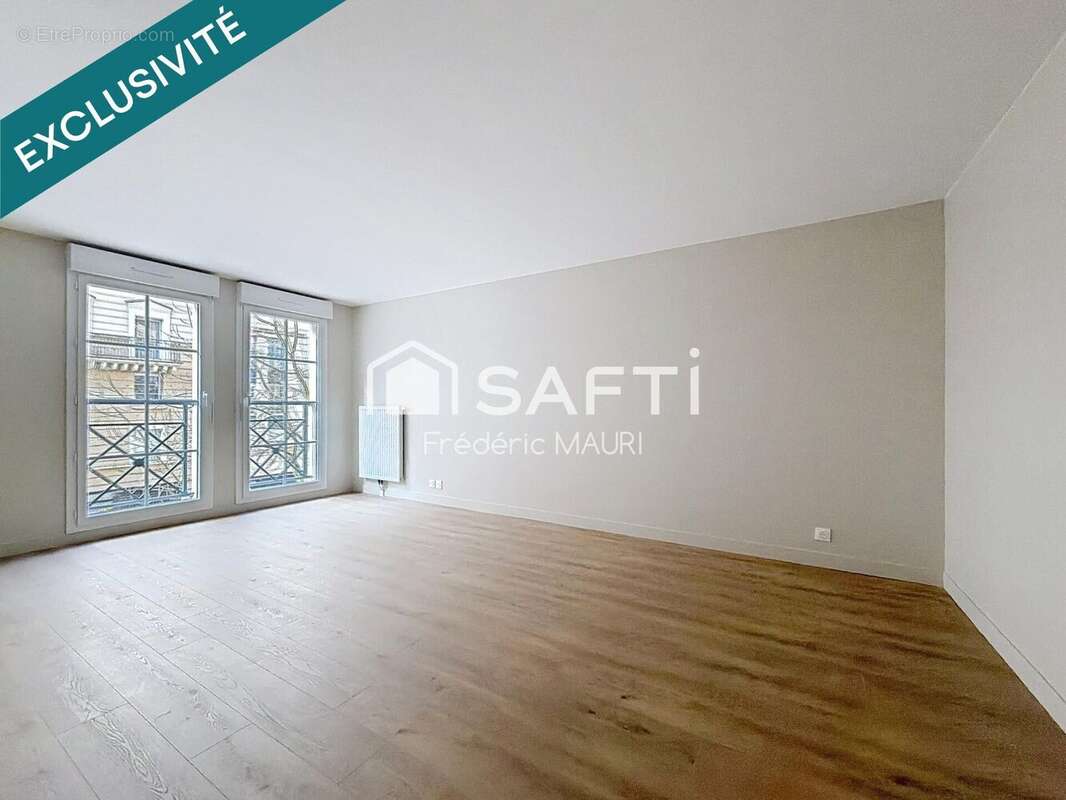 Photo 2 - Appartement à COURBEVOIE