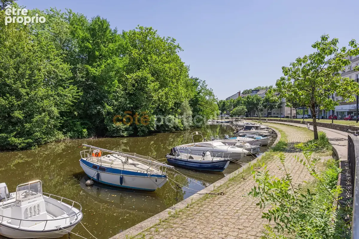 Ile de versailles -- appartement t4 -- 91m2 -- 2 chambres -- vue sur l'erdre  --  jardin partagé -- garage possible -- proximite - photo 14