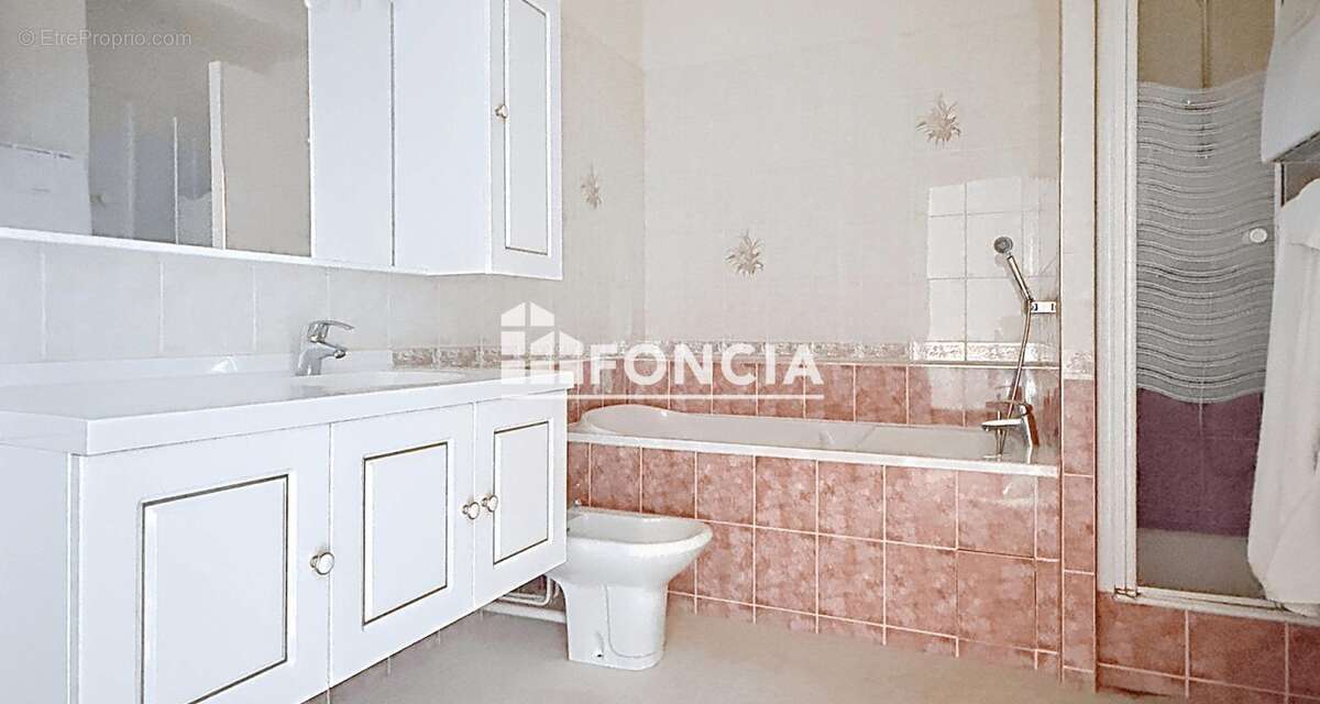 Superbe appartement de 118 m² avec ascenseur, garage et jardin privatif - photo 4