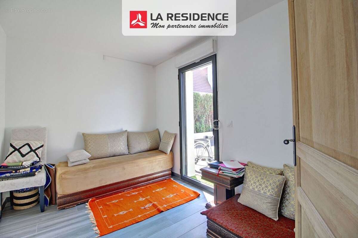Maison 122 m² à Saint-Etienne-Du-Rouvray  - photo 4