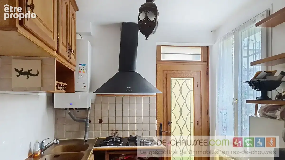 Rue saint maur  appartement en duplex avec boutique - photo 4