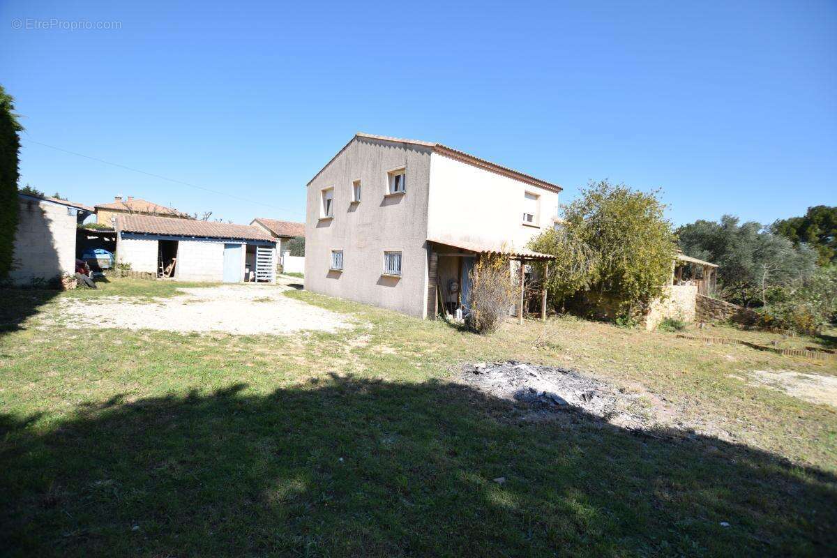 Maison à LAUDUN-L'ARDOISE