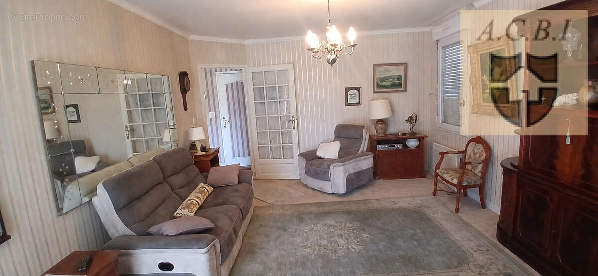 A VENDRE - Appartement - photo 4