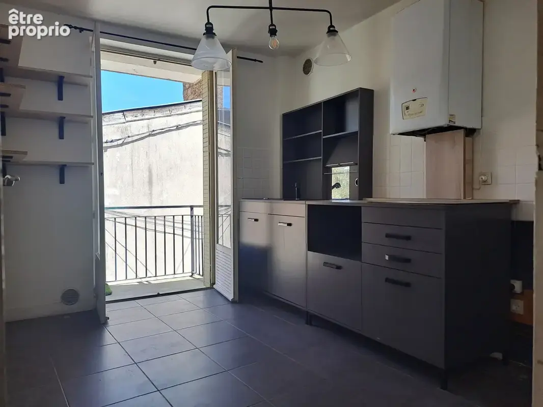 Appartement T3 de 61m2 dans le centre de Couzon ! - photo 4