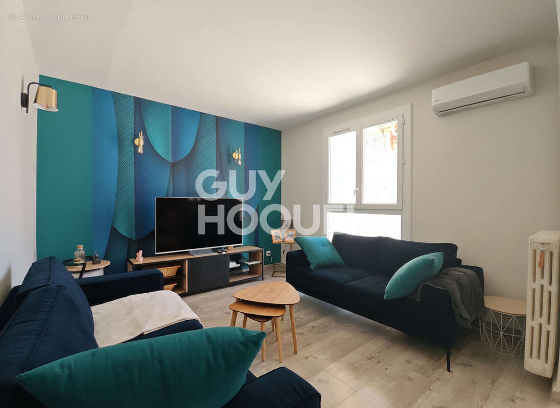 Magnifique T4 de 87m² avec terrasse de 80m² - Proximité Centre-ville - Résidence sécurisée avec ascenseur et garage ! - photo 4