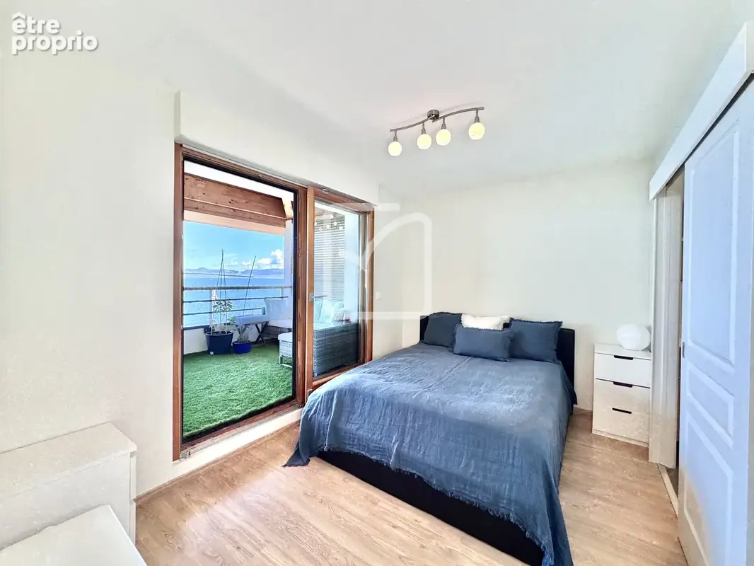 Appartement T4 de 90m2 pied dans l'eau - Amphion-Les-Bains - photo 9