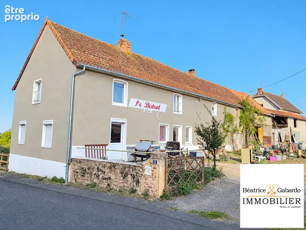 Maison en pierre avec dépendances et fort potentiel - photo 1