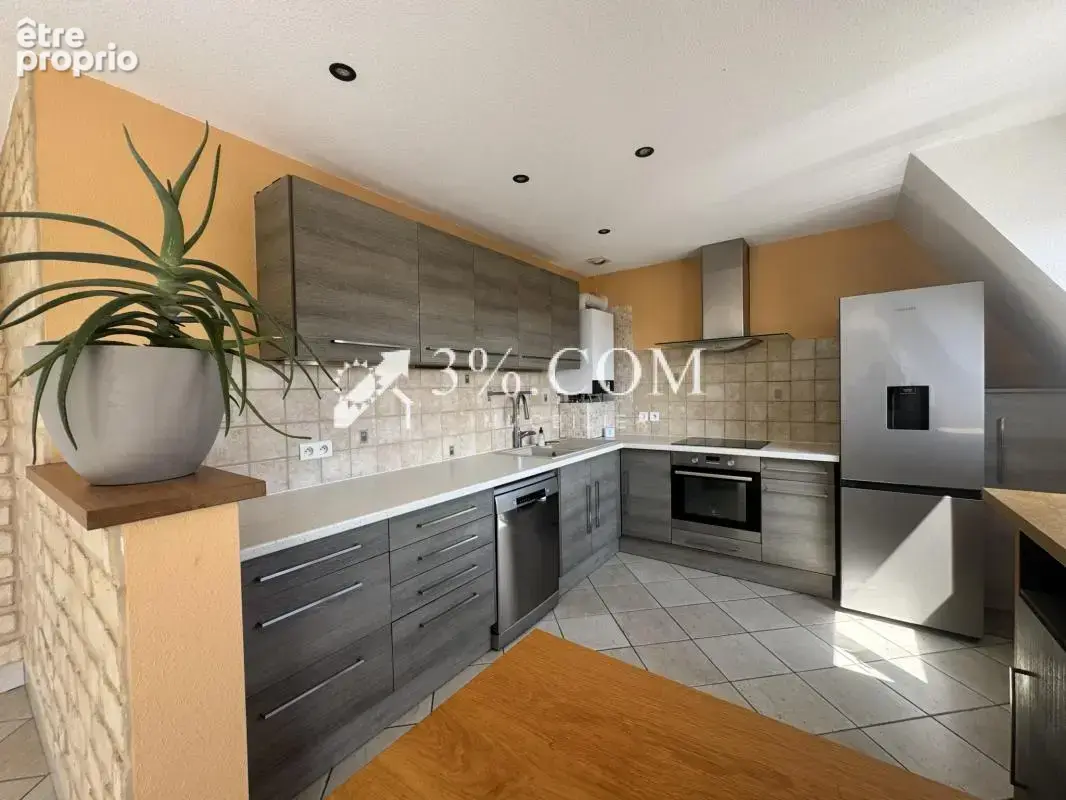 3%COM  Bel Appartement F4 avec garage - photo 5