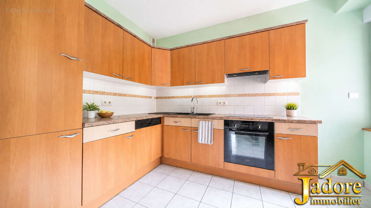 Appatrtement f4 1er etage - photo 7