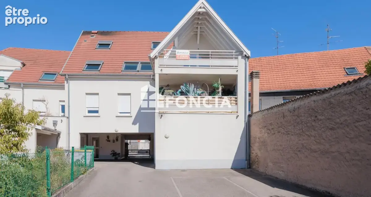 Coup de cœur – Élégant duplex en centre-ville avec terrasse, garage et cave - photo 5