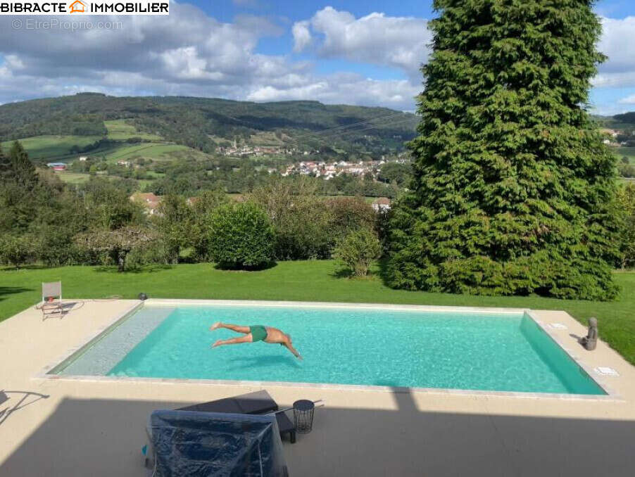 Maison à SAINT-SYMPHORIEN-DE-MARMAGNE