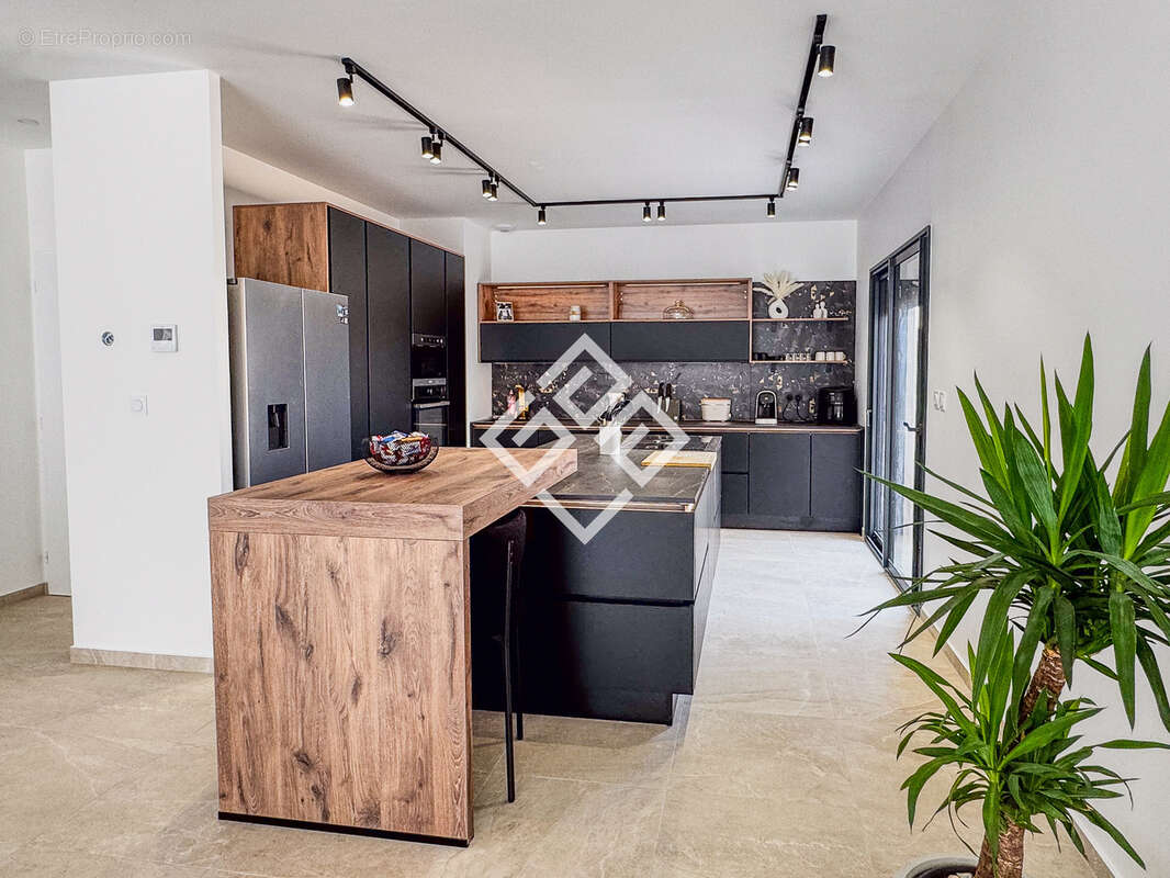 Une élégante villa contemporaine de plain-pied - photo 9
