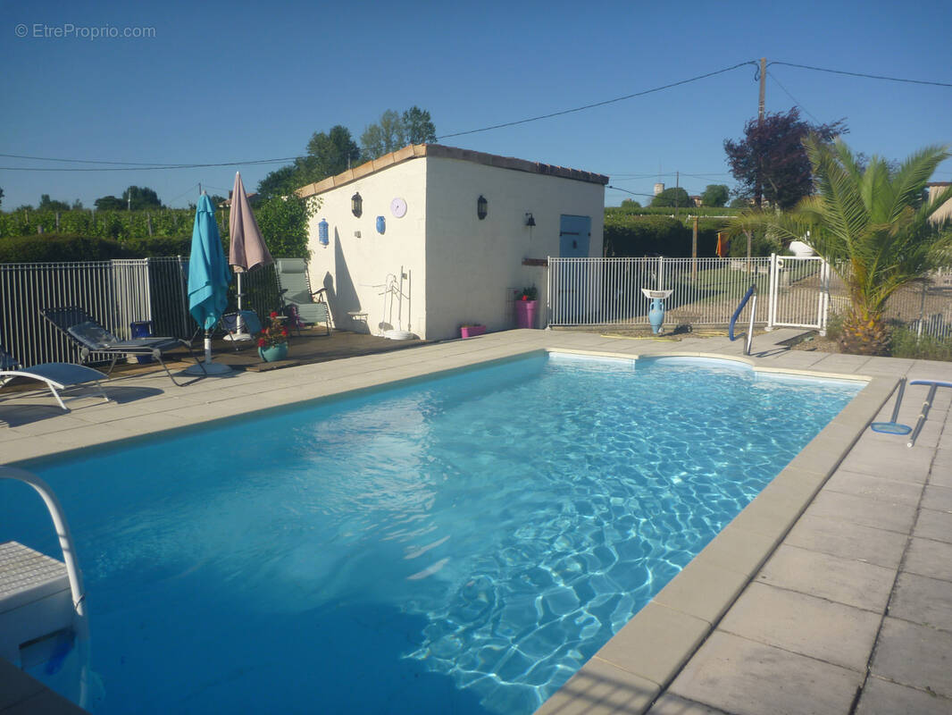 Maison plain-pied sejour 3 ch piscine garage - photo 2