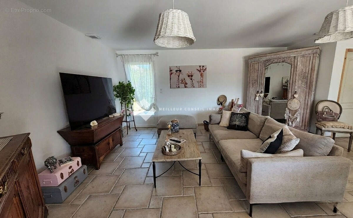 Maison 130 m² à Saint-Julien-De-Cassagnas  - photo 8