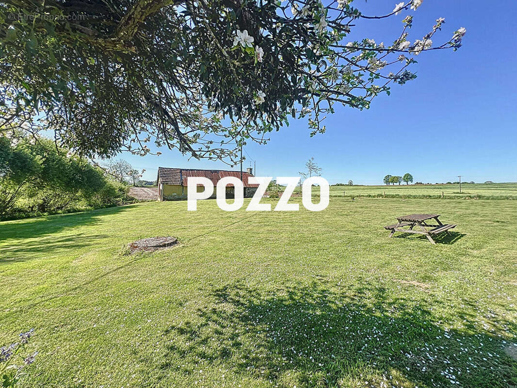 Maison à JUVIGNY-LE-TERTRE