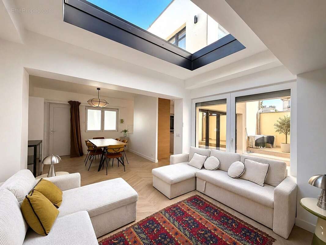 COLOMBES Les Vallées , maison de 112 m² hab +  terrasse de 35 m² et patio central - photo 2