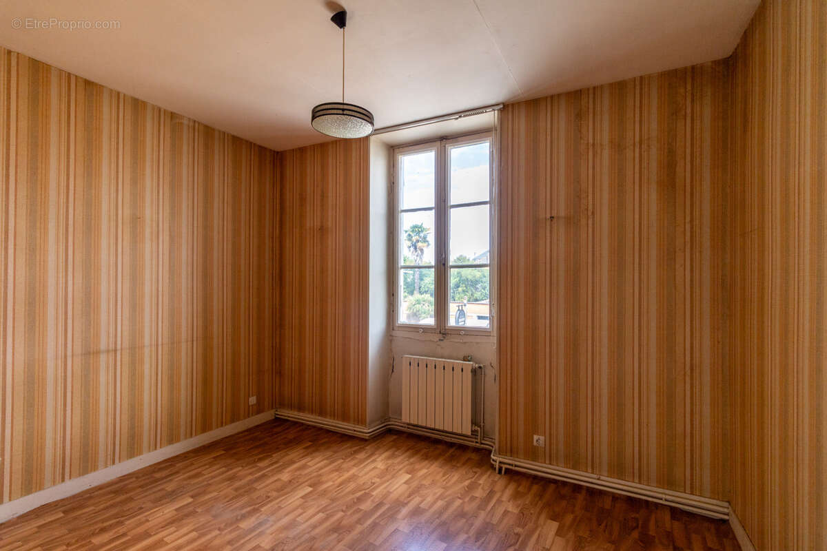 Maison de ville à rénover - photo 8
