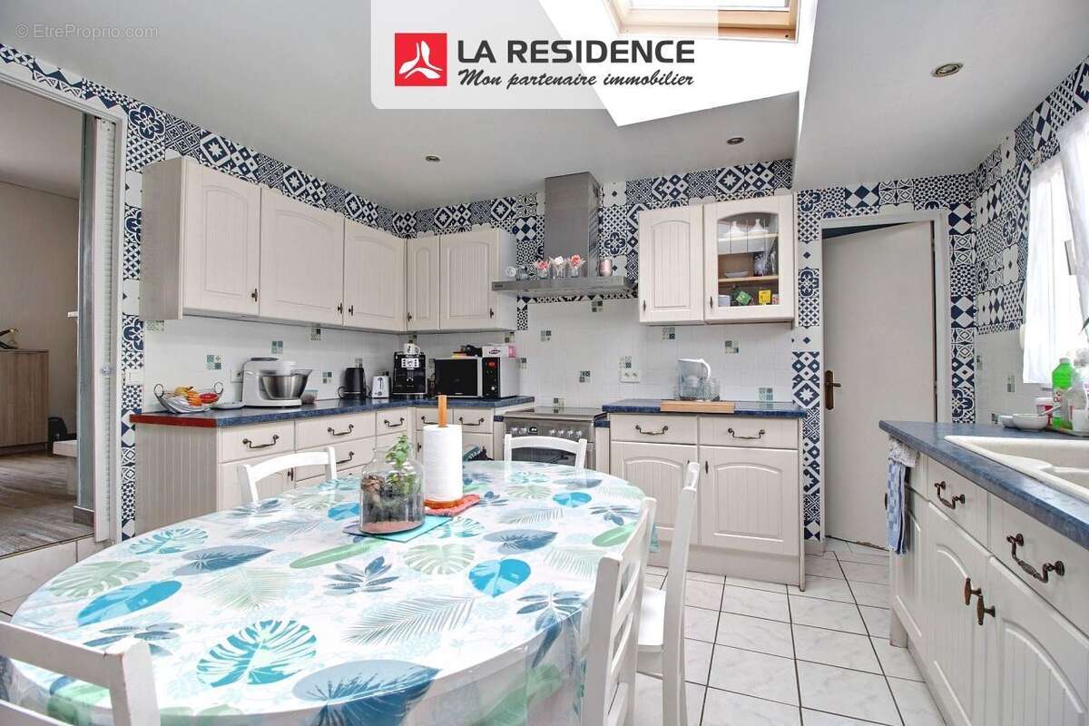 Maison 102 m² à Saint-Etienne-Du-Rouvray  - photo 4