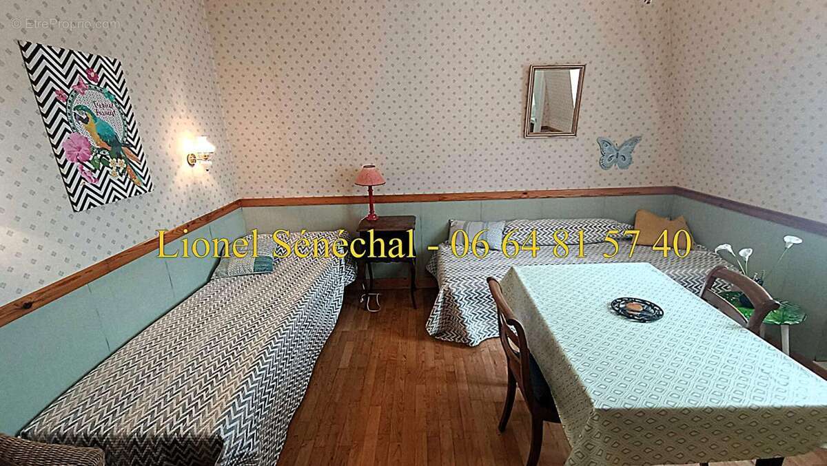 Opportunité rare : immeuble de caractère avec 12 studios dans une demeure de prestige en plein centre-ville de Bagnoles-de-l'Orn - photo 5