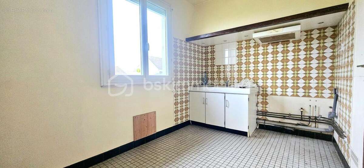 GIEN - Pavillon de plain-pied avec grand jardin clos de 1 068 m² - potentiel à exploiter - photo 12