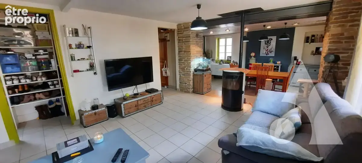Ensemble immobilier comprenant un appartement de 118 m² avec terrasse et garage + un local commercial de 44 m² - photo 5