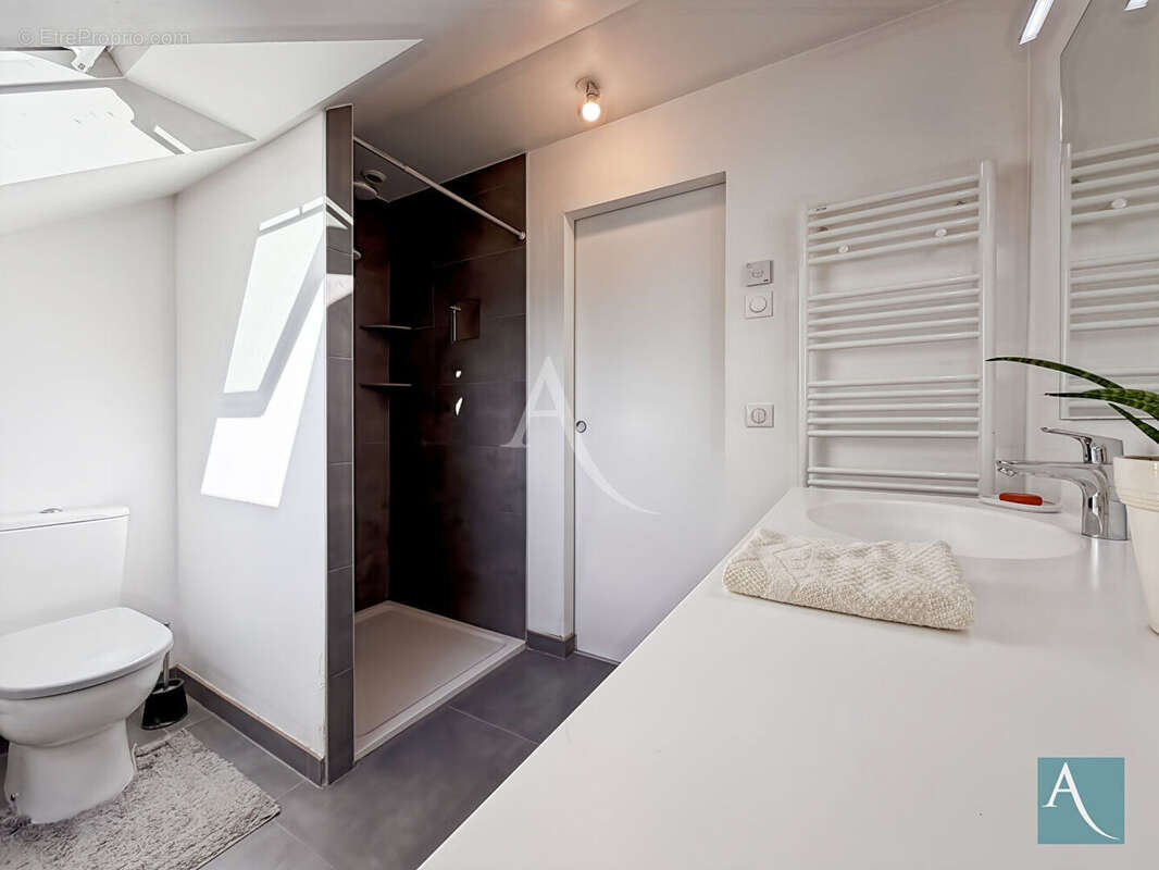 Maison 5 pièces - 128 m² habitables - Sous-sol total, 2 terrasses couvertes, jardin - Linas 91310 - photo 8
