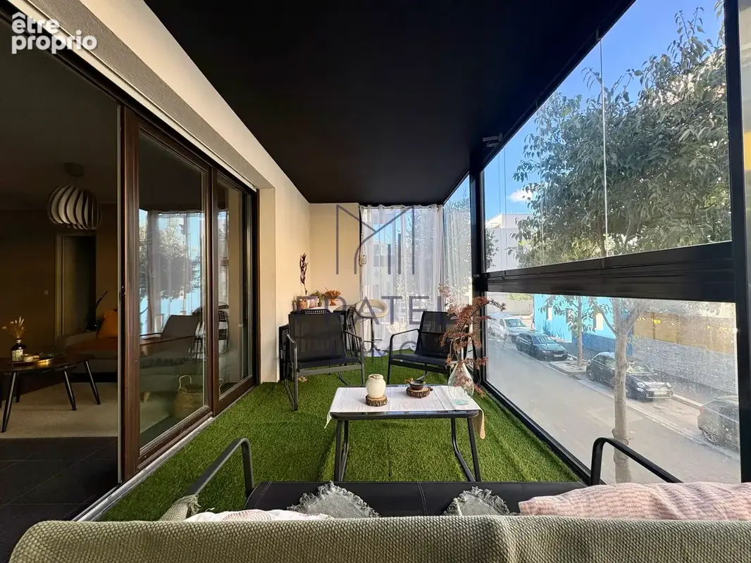 T3 avec Véranda de 12 M2 et garage boxé en sous sol - photo 10