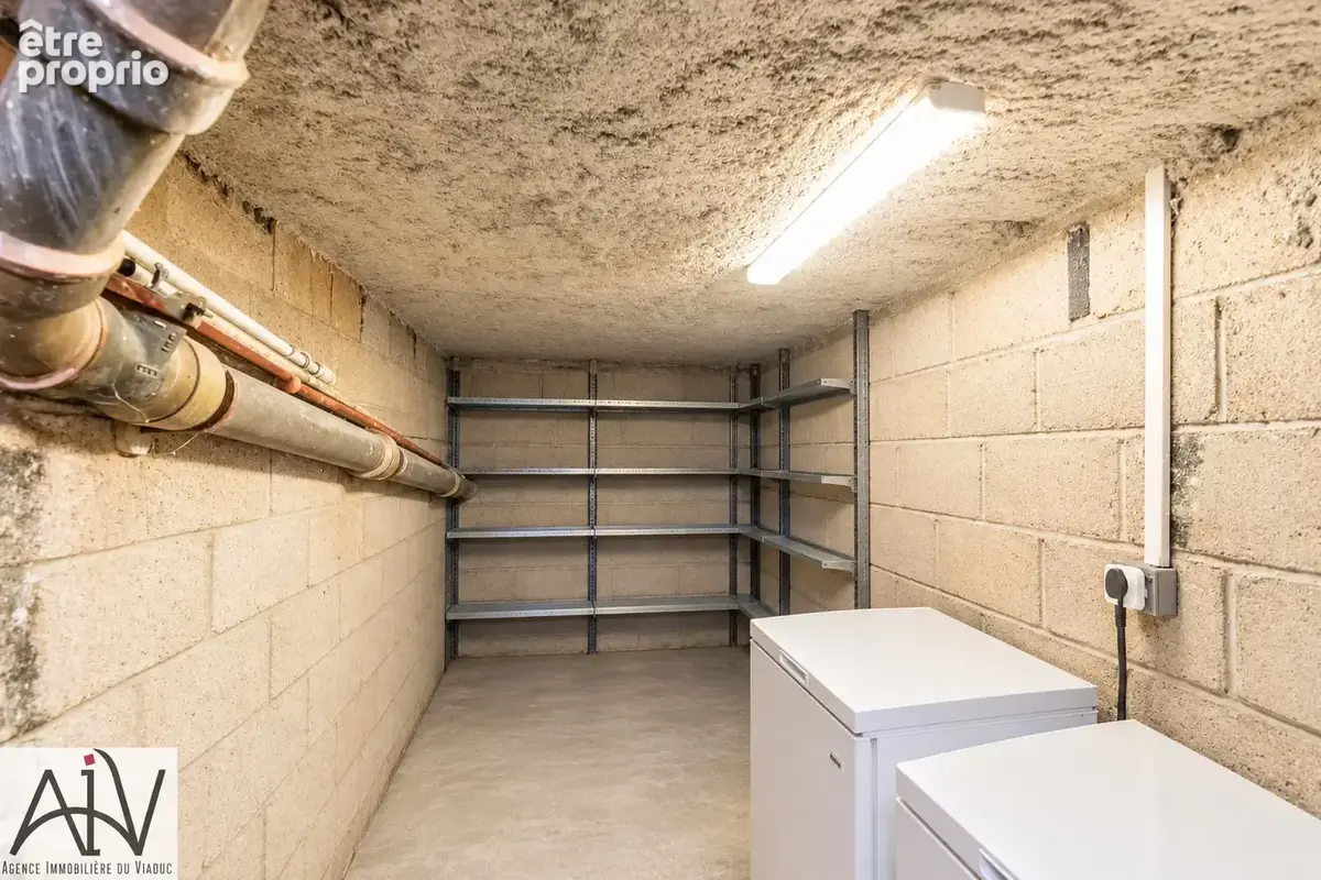 Appartement 5 pièces de 82 m2 avec trois chambres, box et cave - photo 11