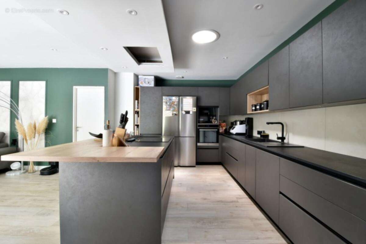 Exclusivité - maison atypique rénovée – 5 chambres – sous-sol complet – environnement privilégié - photo 4