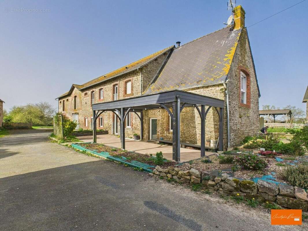 Photo 2 - Maison à LA BAZOGE-MONTPINCON