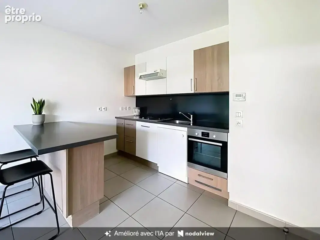 Bel appartement T3 avec grande loggia vue jardin - photo 2