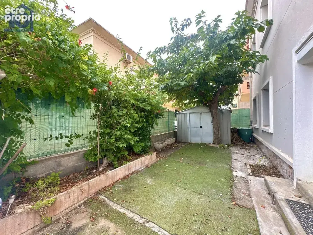 Appartement en rez-de-jardin - photo 11
