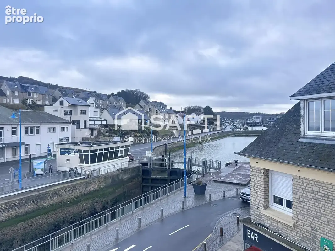Photo 1 - Commerce à PORT-EN-BESSIN-HUPPAIN