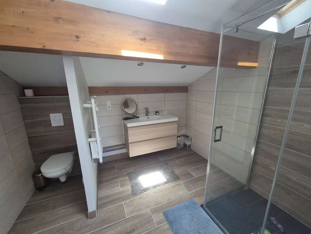 Maison de plain pied de 160m² - photo 11