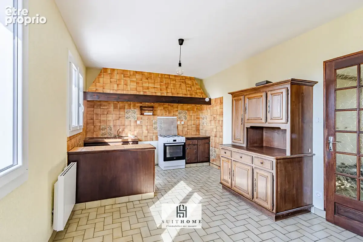 Maison familiale de 131 m² avec sous-sol et double garage - photo 5